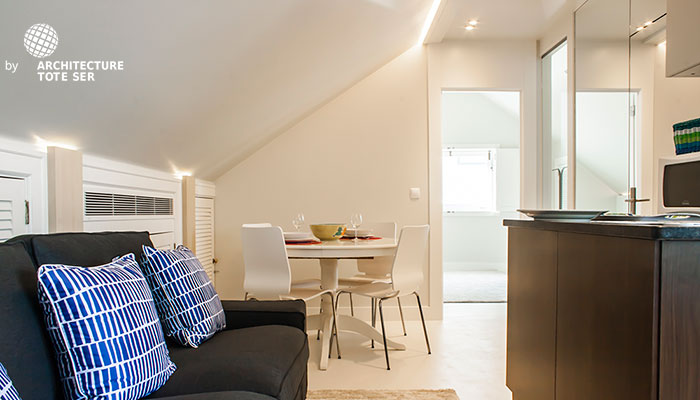 Living and dining room of the 2 bedroom duplex apartment in Chiado, Lisbon